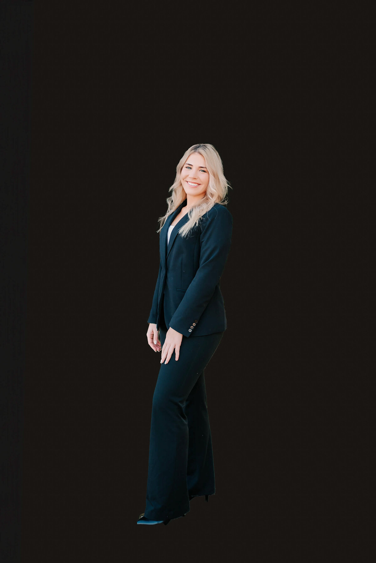 branding photography in Bransn of woman standing against black background