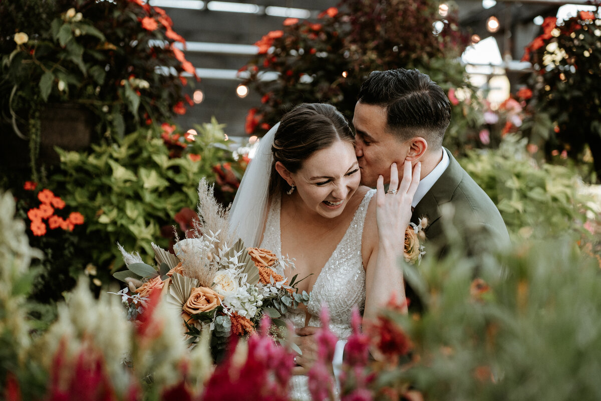 bride & groom smiling