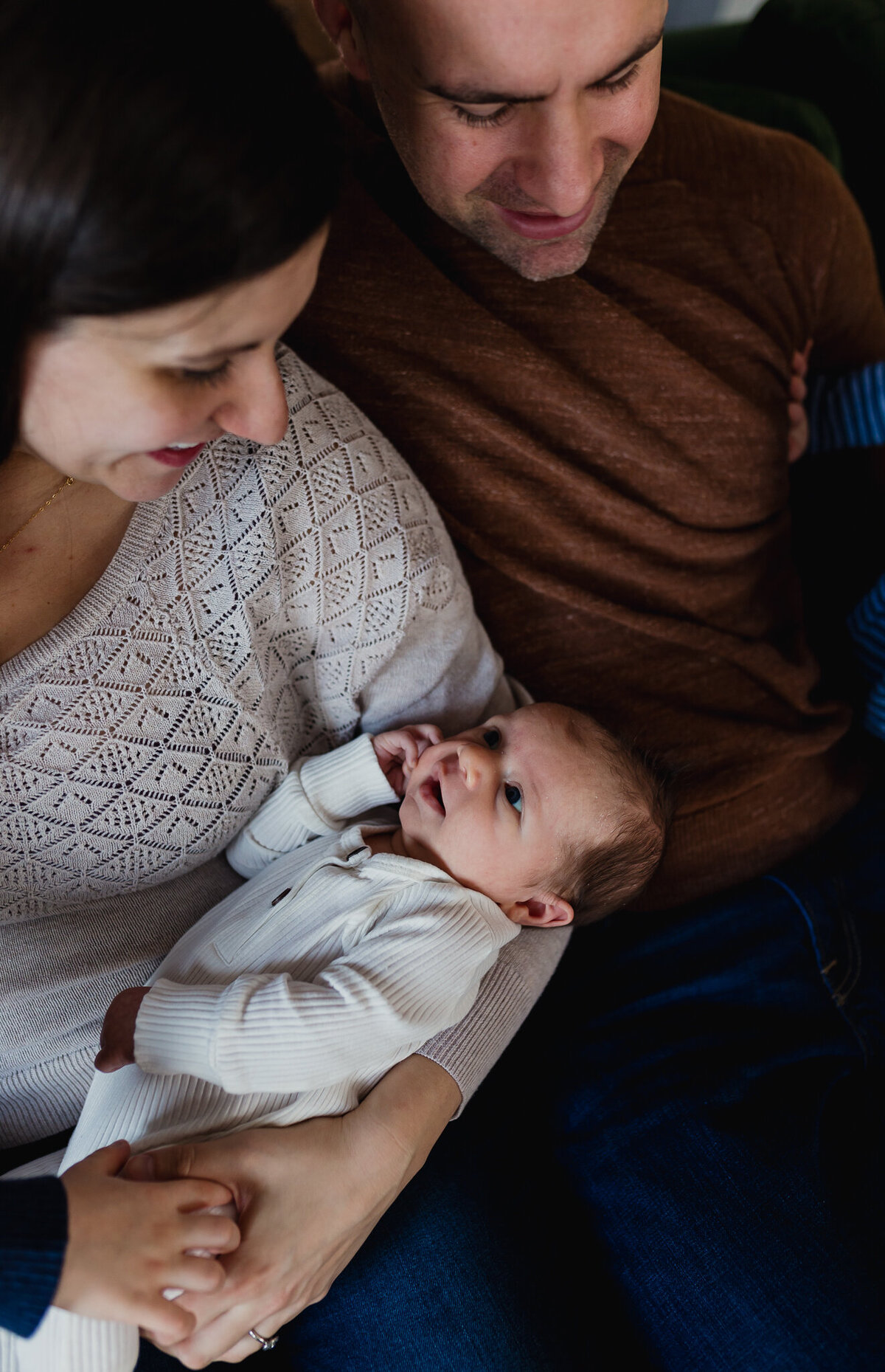Infant photography of a mom holding new born baby