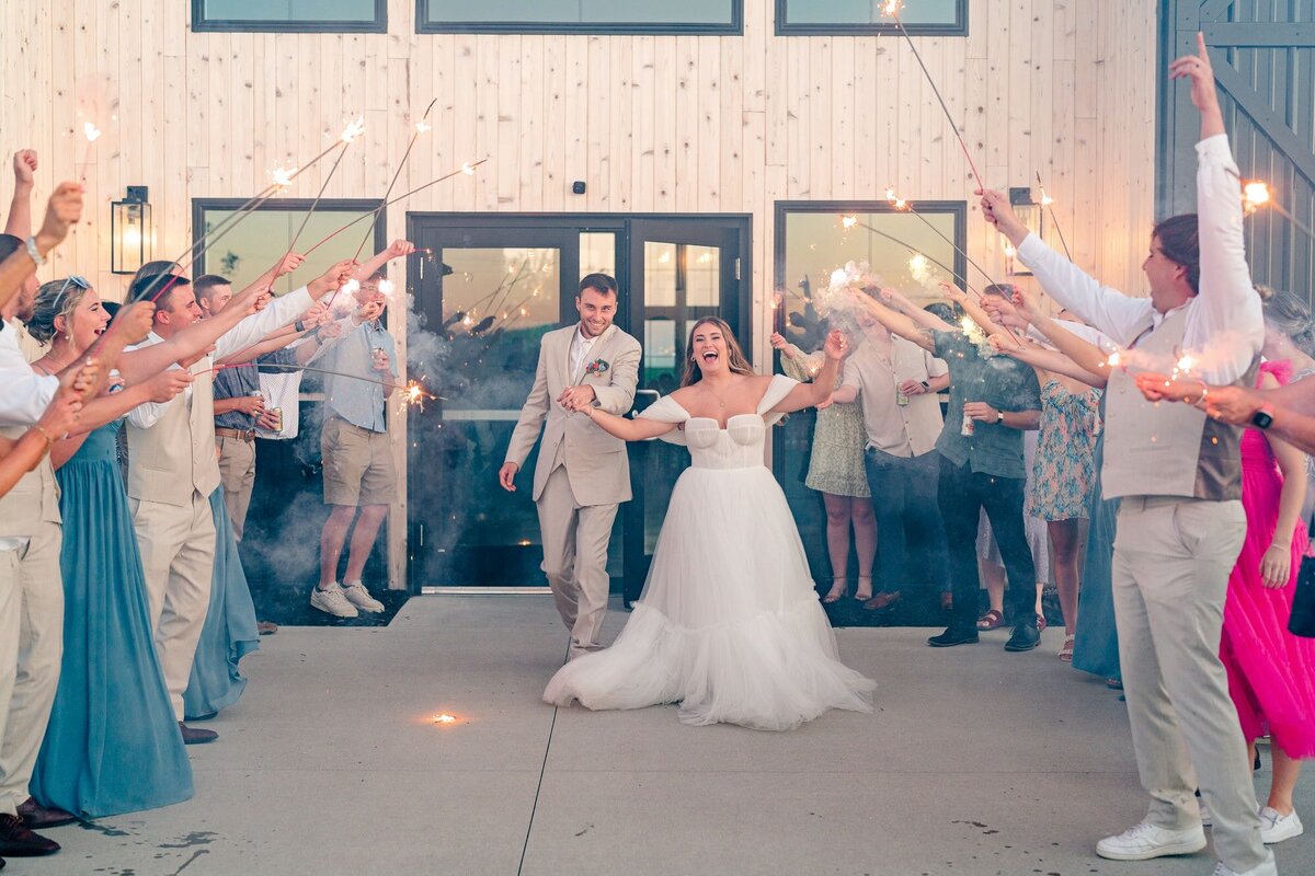 bride-groom-celebrating-grand-exit
