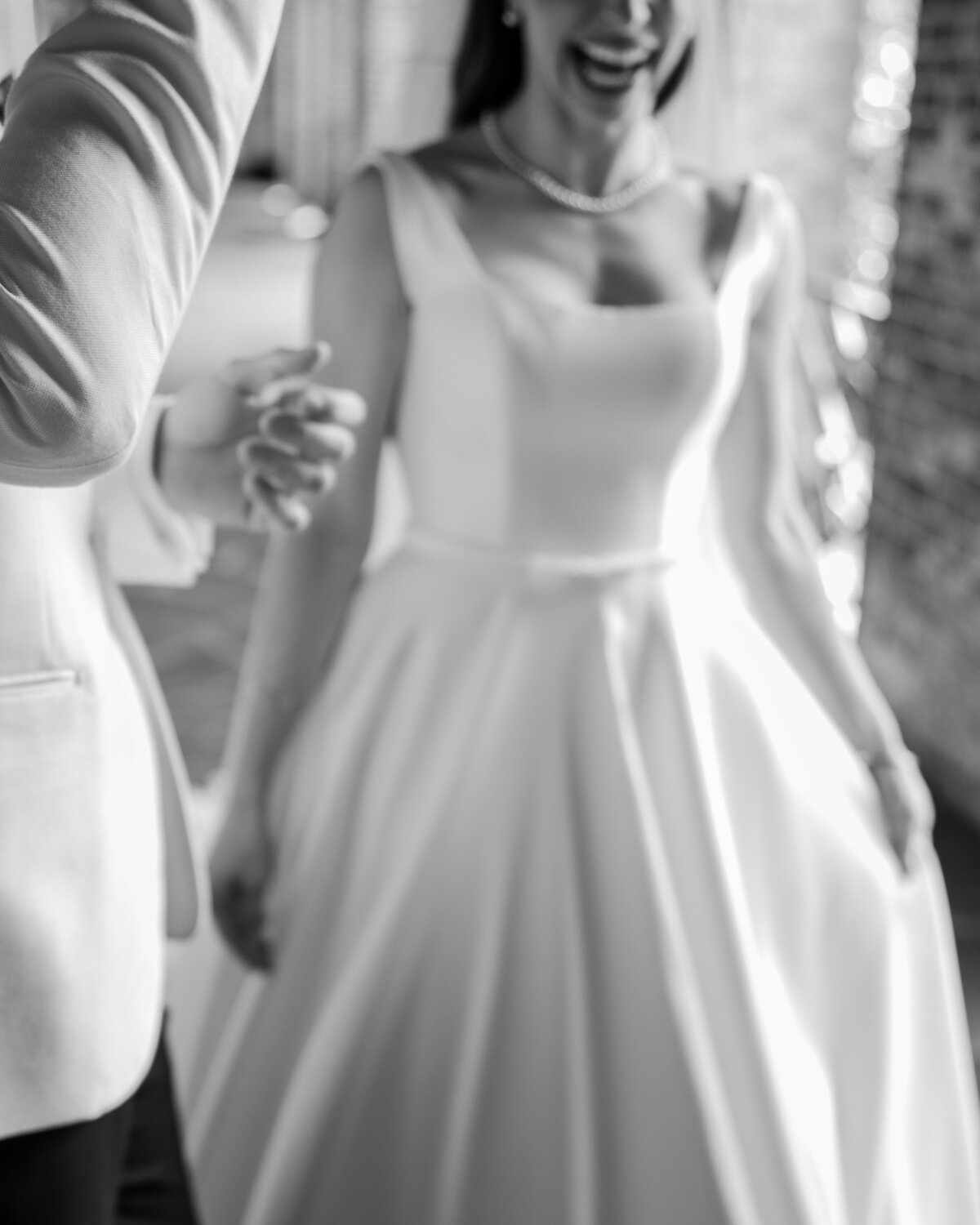 Black and white photograph and a bride and groom.