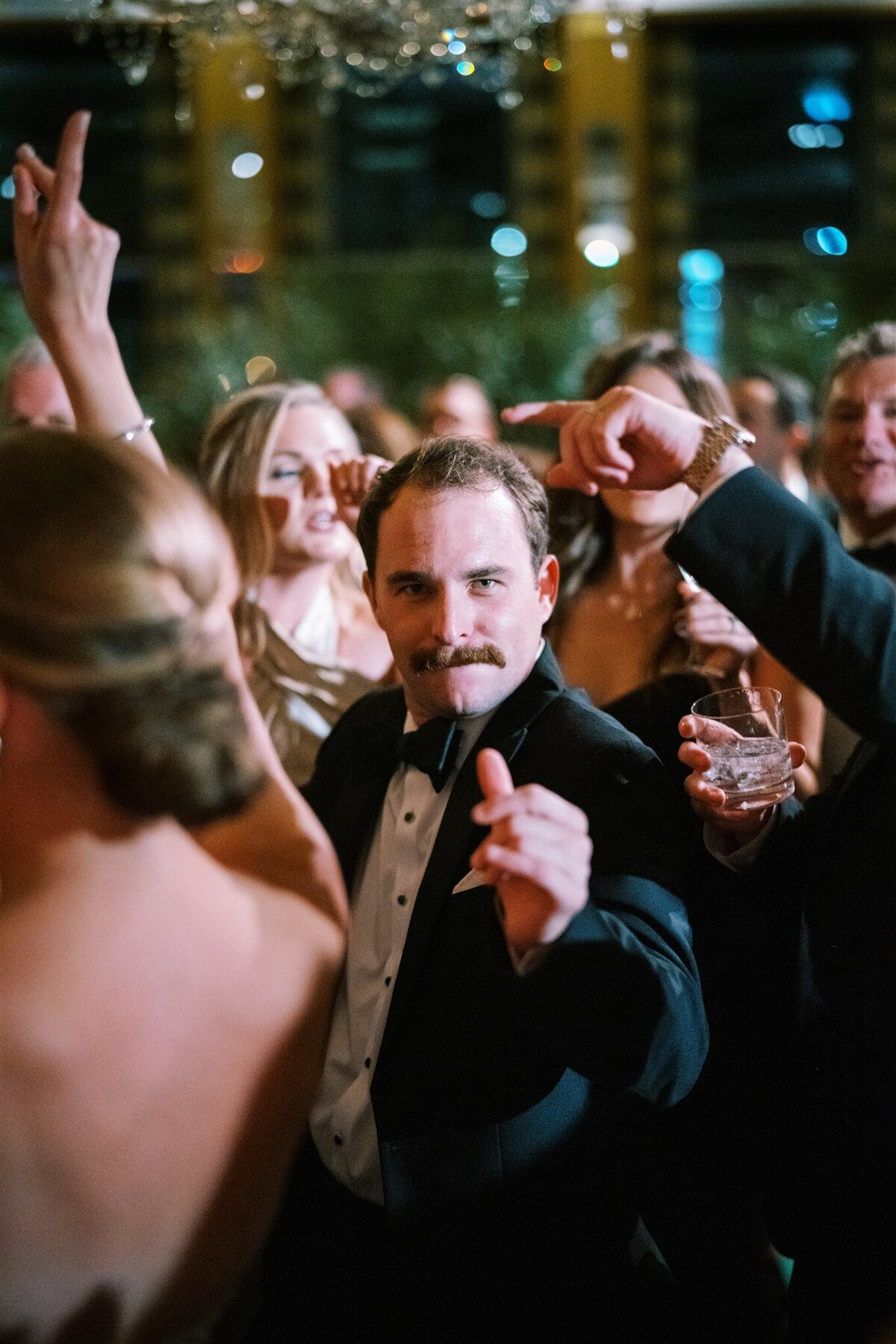 Close up picture of a wedding guest in the crowd. 