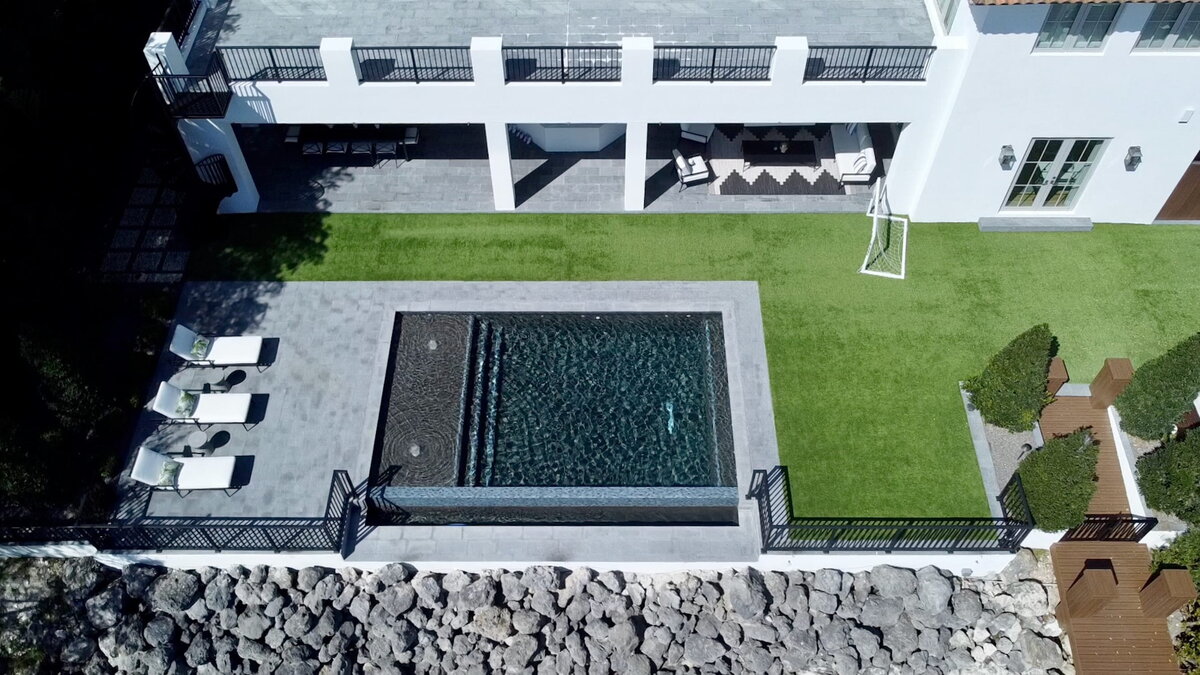 Swimming pool and lounge chairs