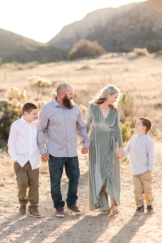 family-walking-laughing-mission-trails-san-diego