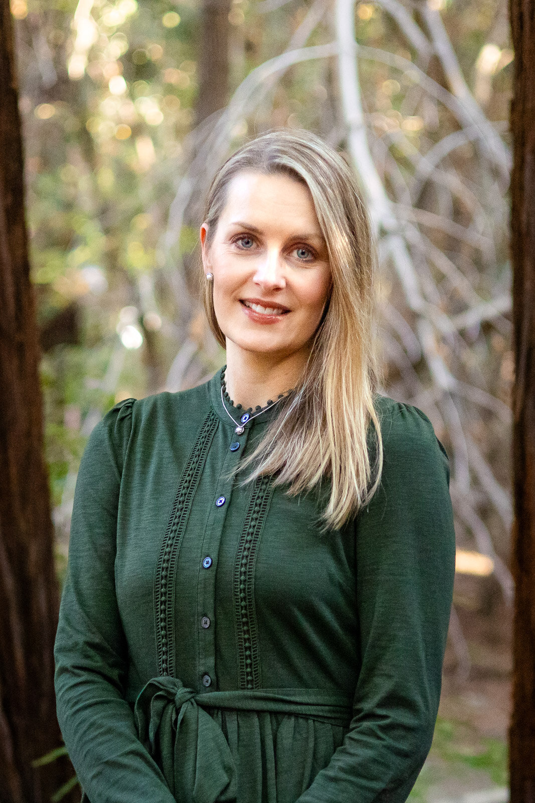 Corporate portrait of woman in green dress in natural light at San Francisco Bay Area park – Bay Area Headshot Portfolio – Ellobelle Photography