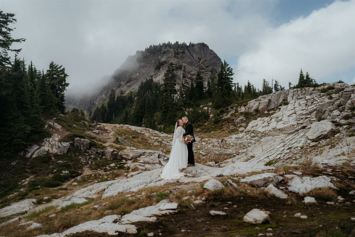 Bride & groom kissing after elopement ceremony at Artist Point in the North Cascades!