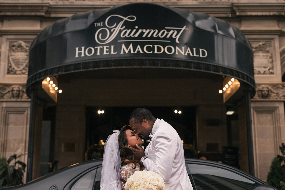 Fairmont Hotel bride groom kiss