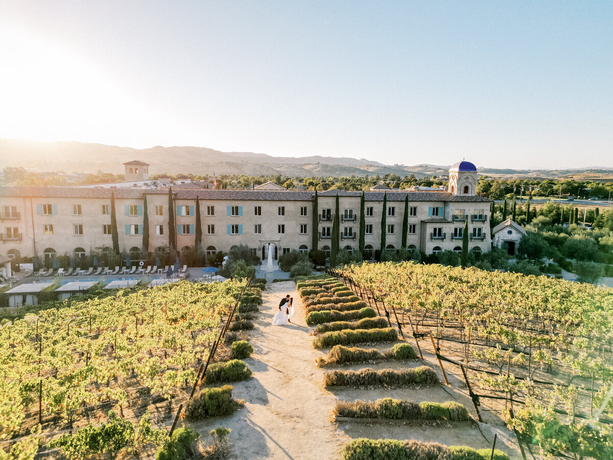 Luxury allegretto resort wedding photos with drone overlooking the vineyards 