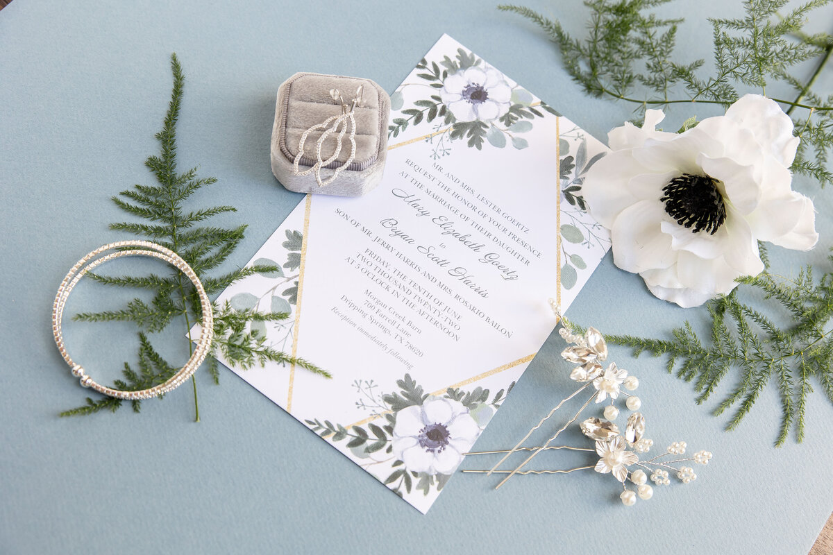 invitation jewelry and white anemone details by Firefly Photography