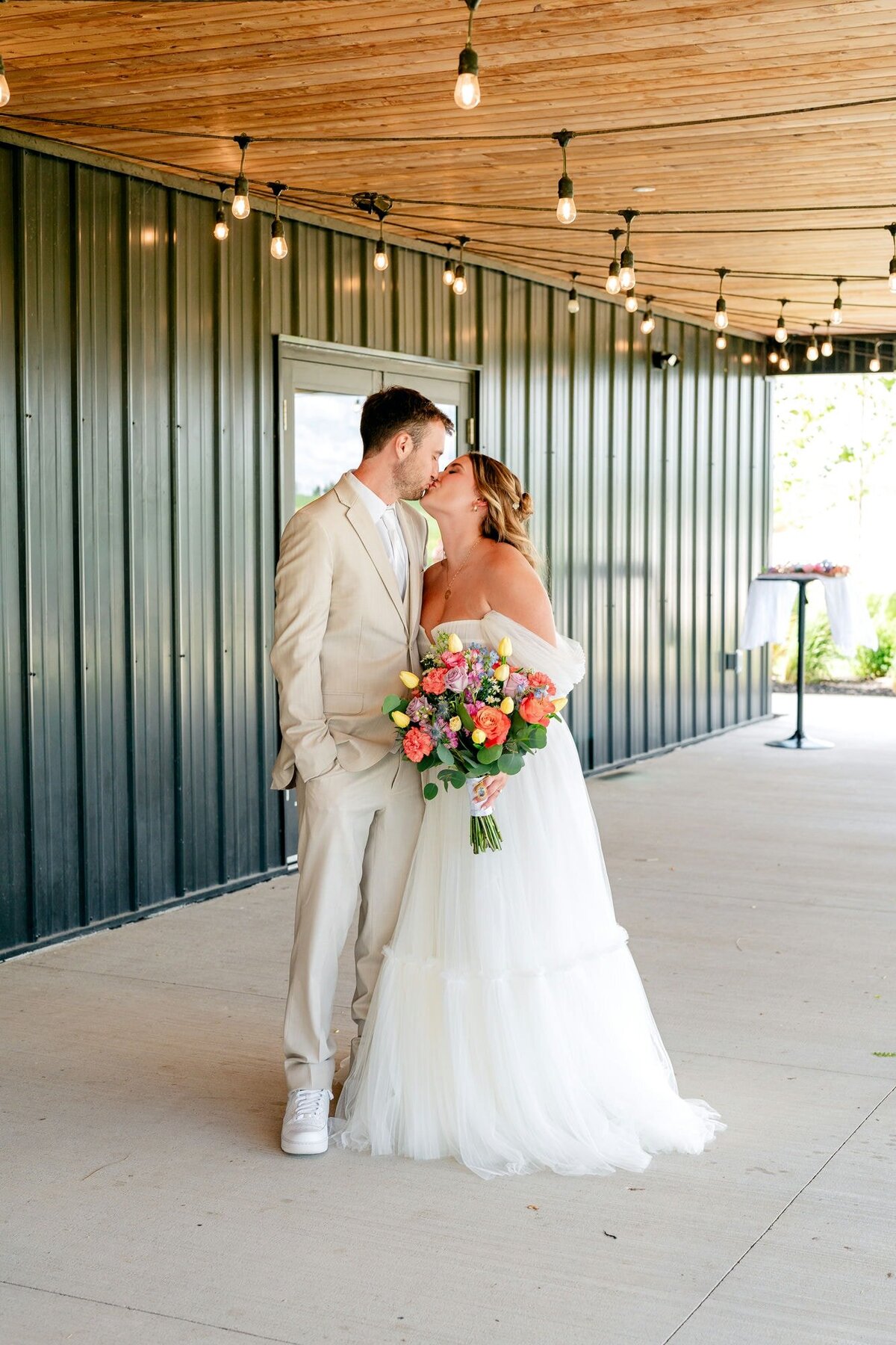bride-groom-embrace-floral