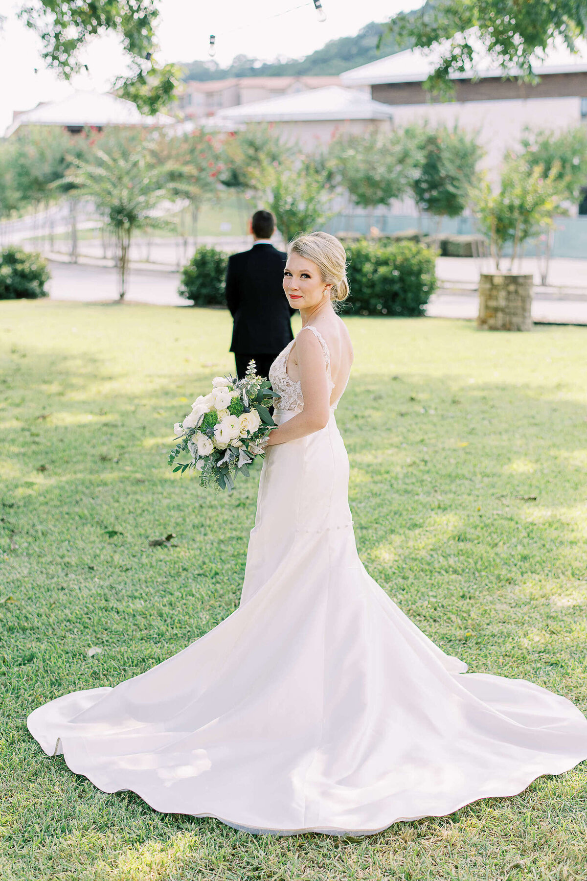 Classic style first look with bride and groom at Texas hill country wedding venue
