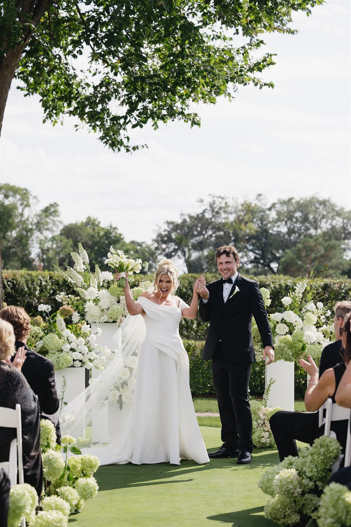 white and green wedding ceremony