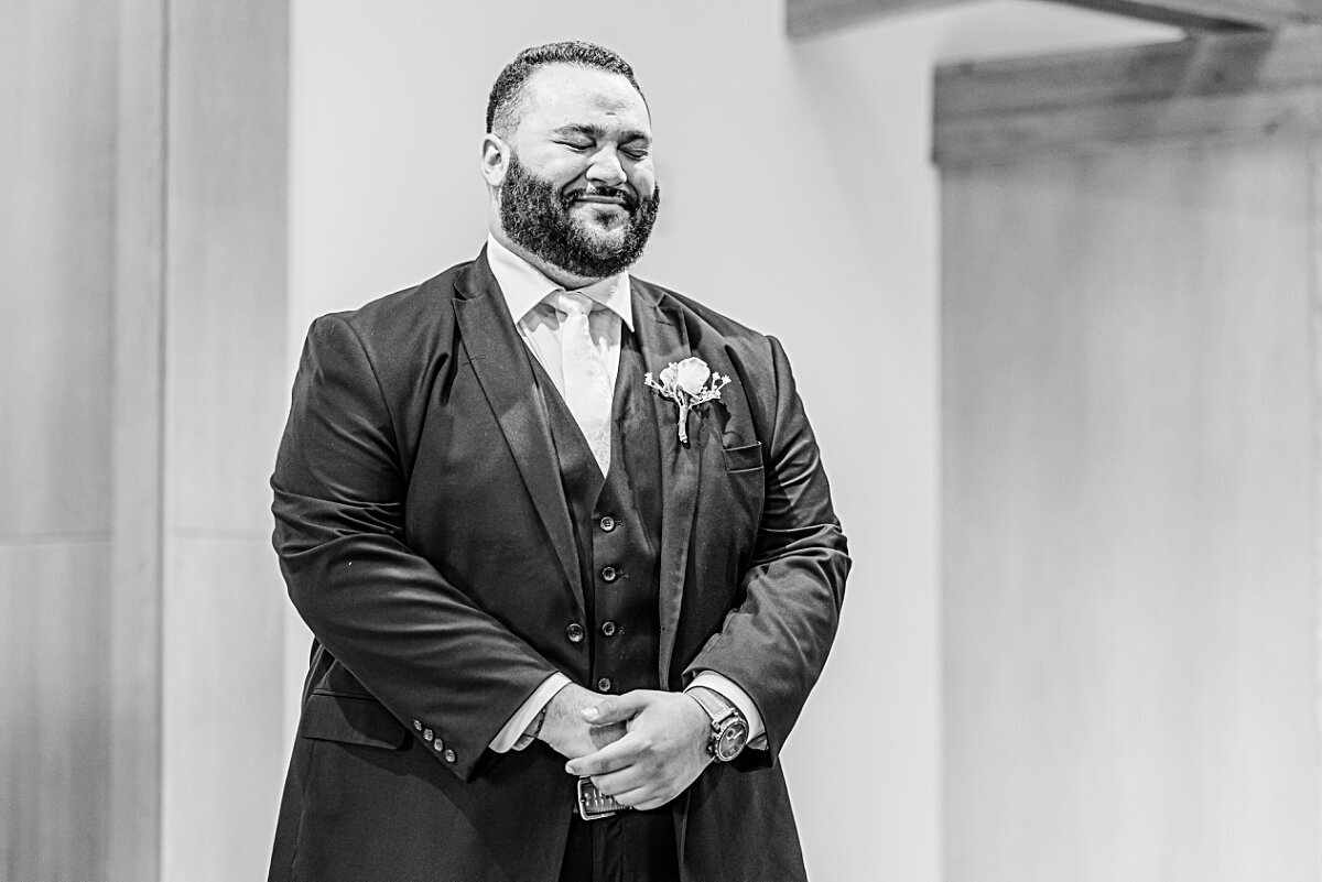 groom-crying-founders-hall-svsu-michigan-wedding-photographer