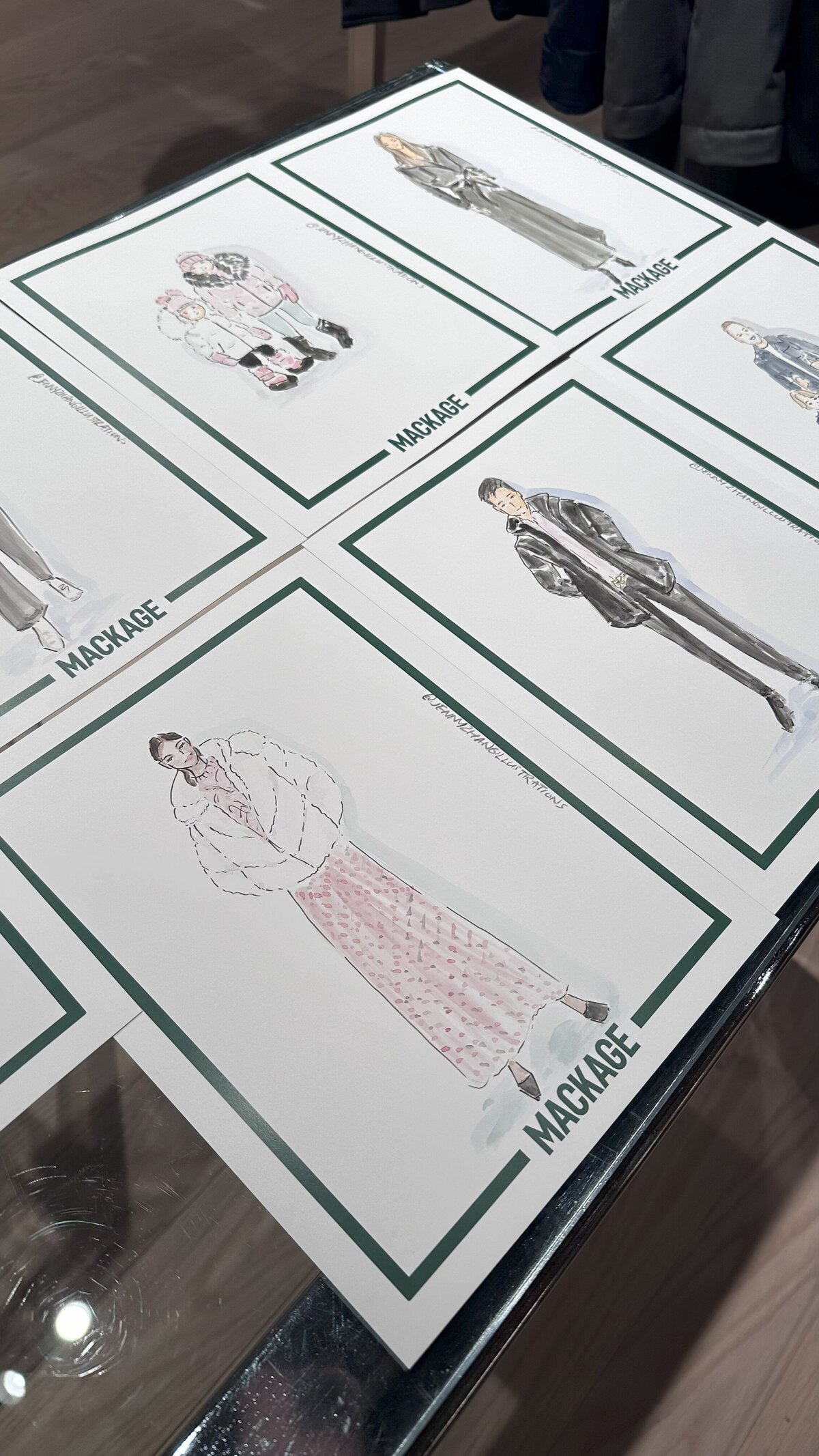 Custom live fashion illustrations of Mackage outerwear at corporate event and brand activation