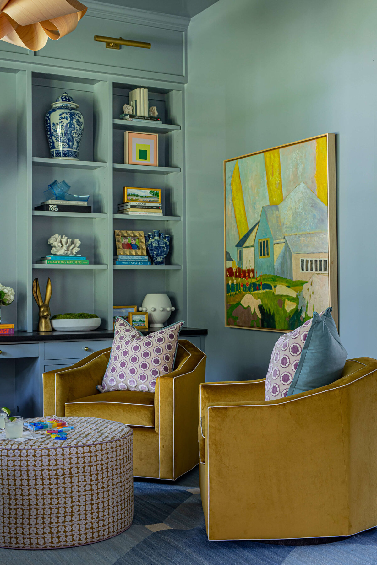 oyster creek studios aryns room yellow chairs in blue living room