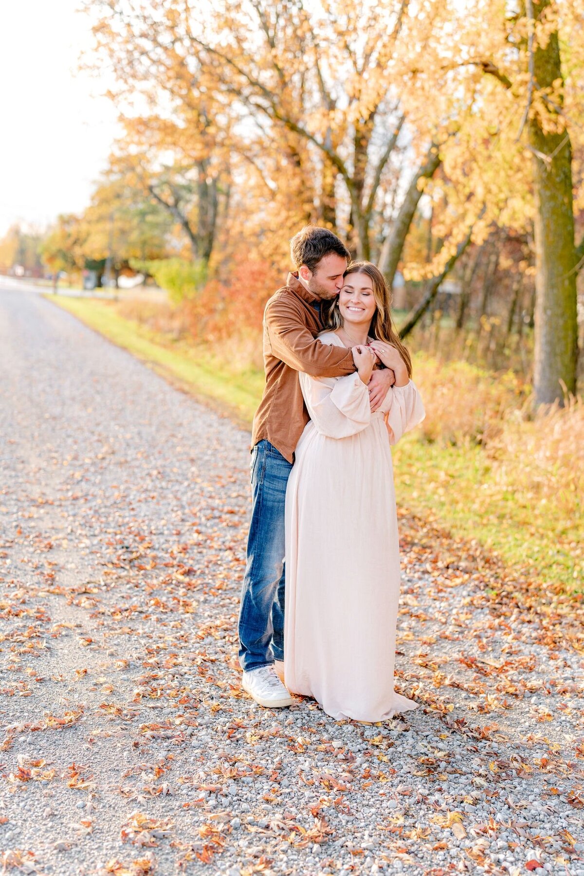 couple-smiling-fall-engagement-session