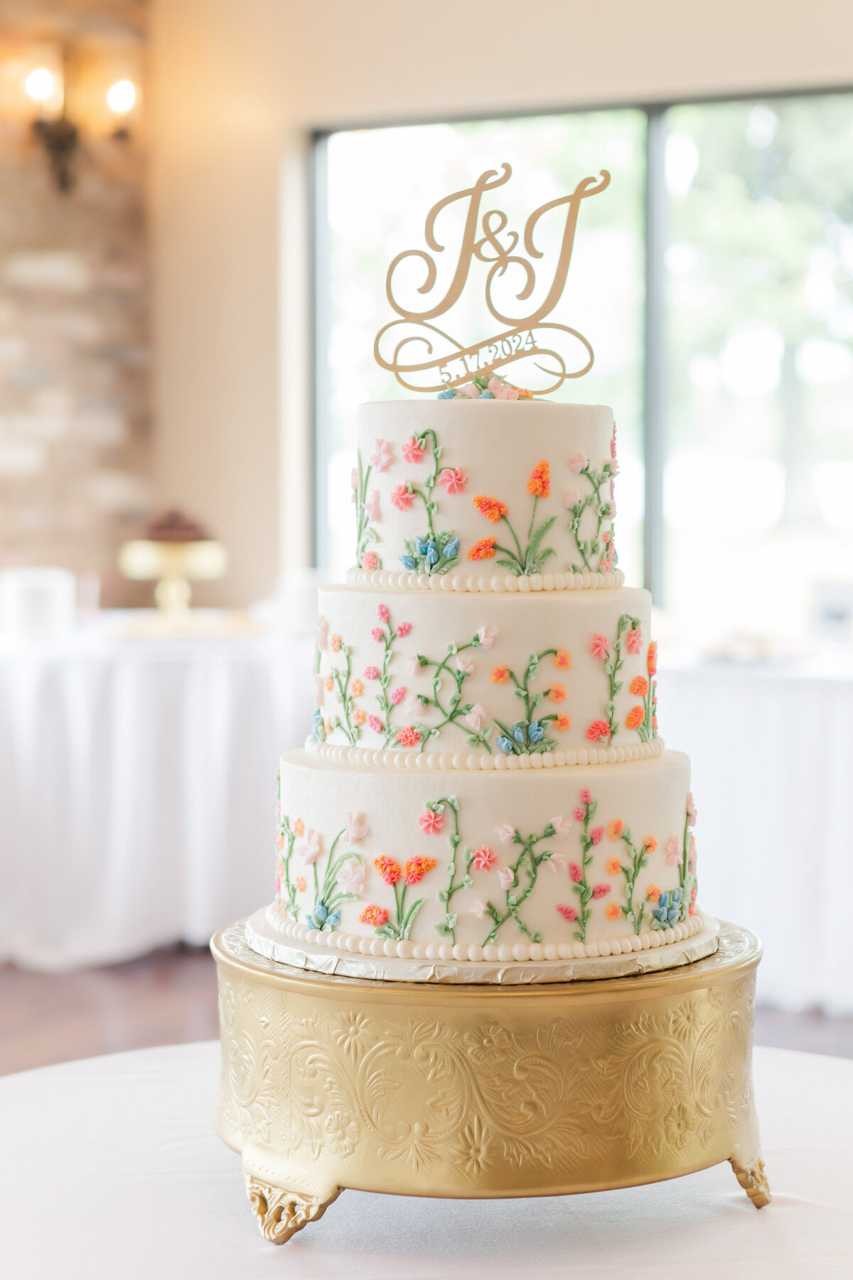 wedding cake spring setup in the event center at vineyards at pine lake