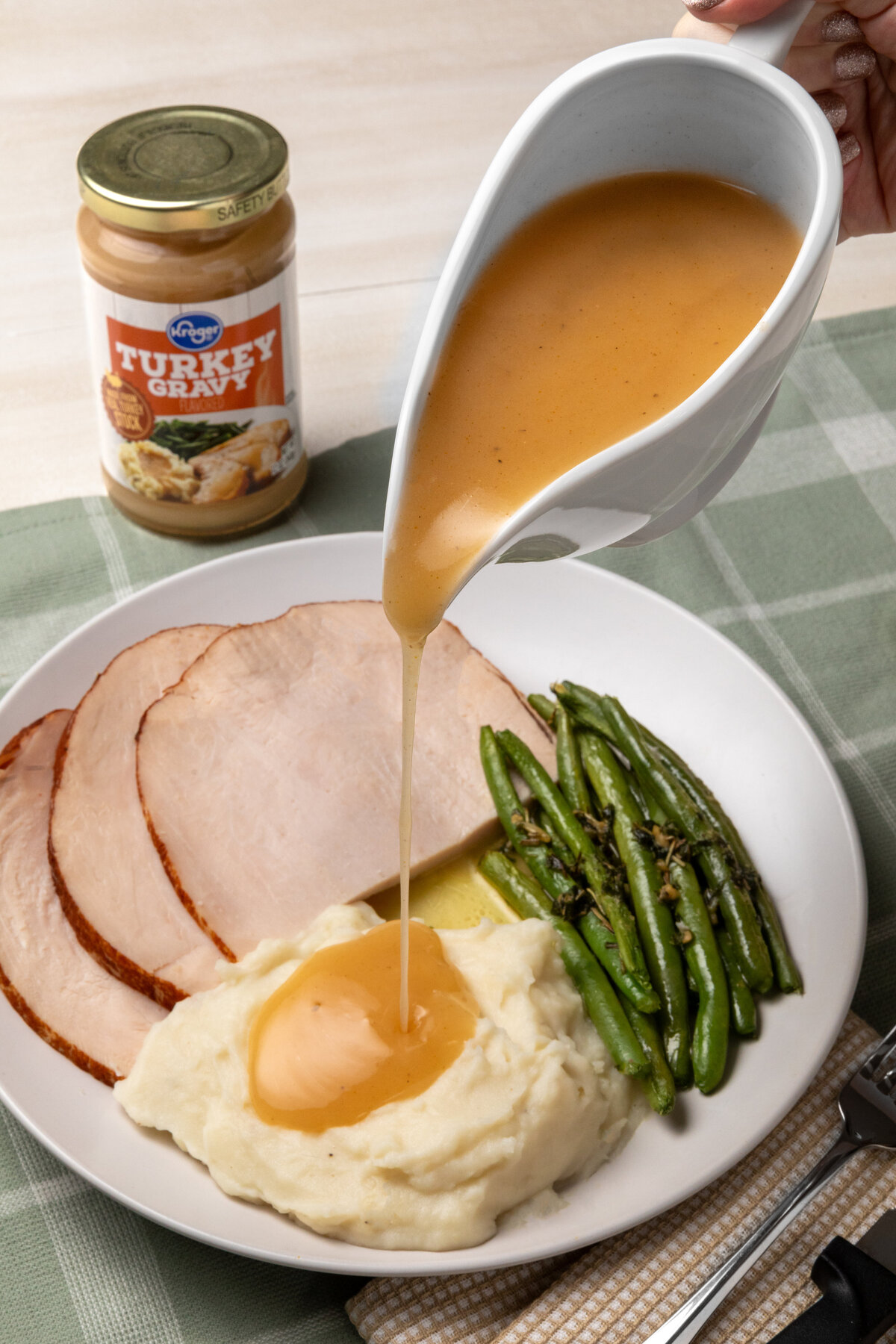 Kroger turkey gravy on mashed potatoes with dinner cut ham christmas dinner. Denver, Colorado restaurant photographer. Denver, Colorado restaurant photography. Denver, Colorado food, beverage, and restaurant photographer. Denver, Colorado food, beverage, and restaurant photography. Denver, Colorado food photographer. Denver, Colorado food photography. 