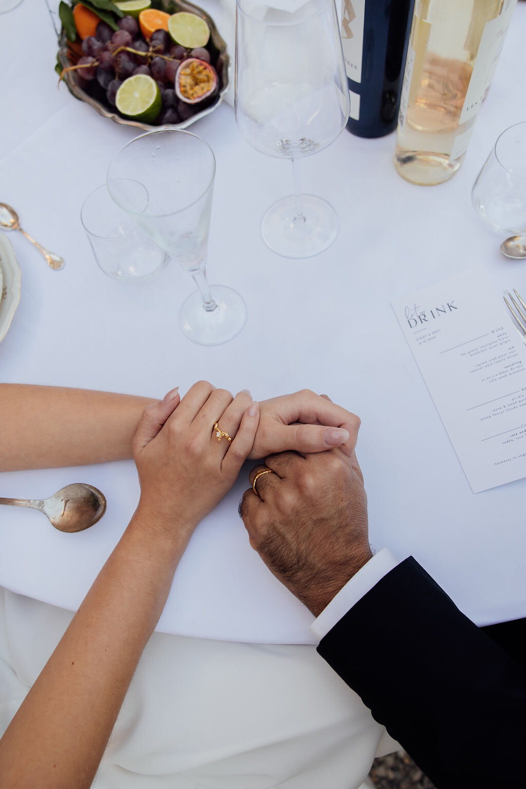 bride-and-groom-holding-hands-chateau-d-agel