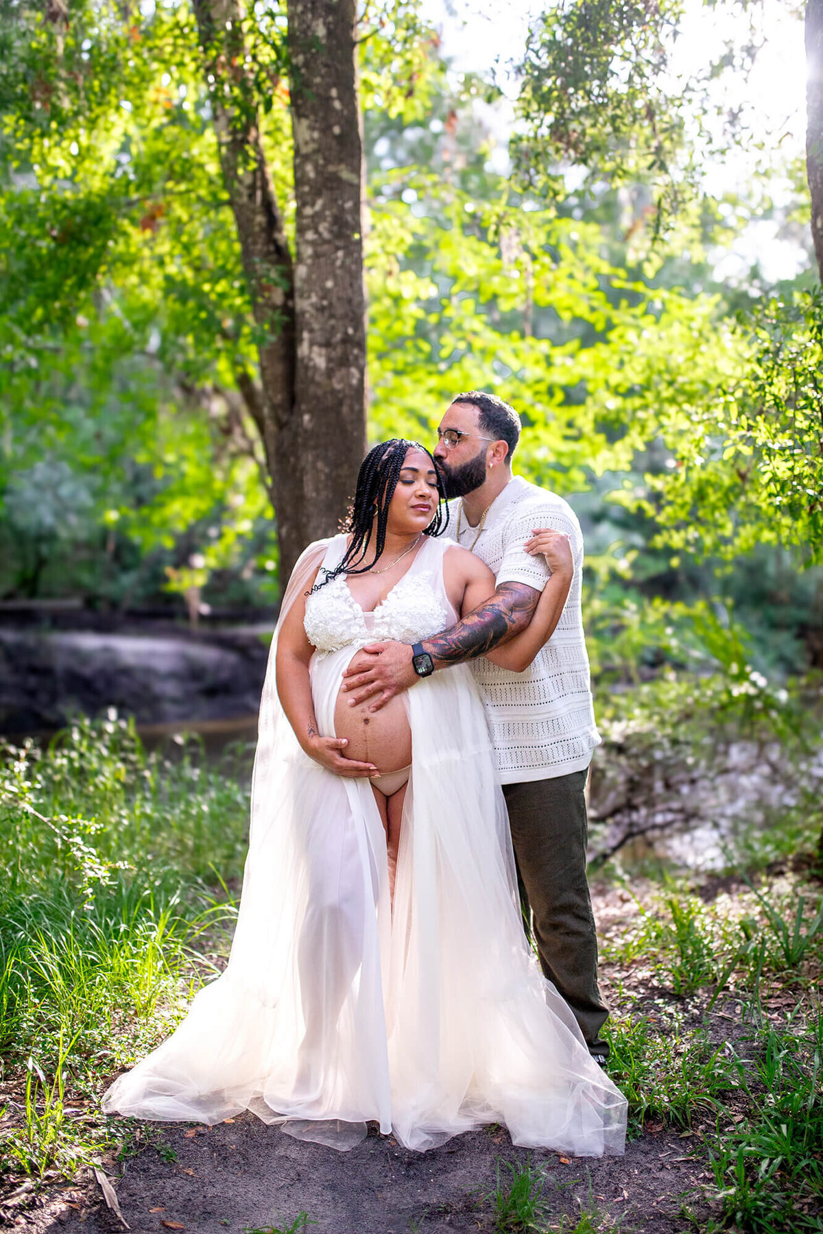 Beautiful soft backlight in maternity session located at Alderman Ford Park in Lithia, FL