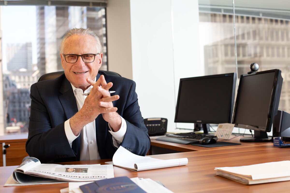 CEO at a desk. Portrait.