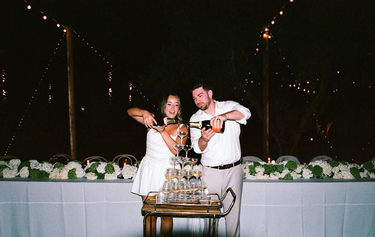 bride and groom champagne tower 35mm film