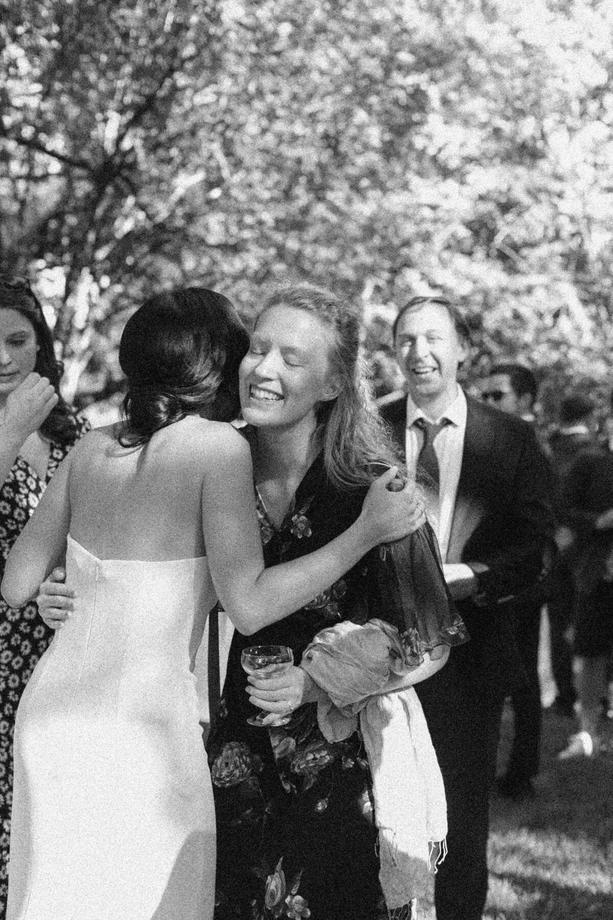 Bride hugging guest at wedding reception at Mattie's wedding venue in Austin
