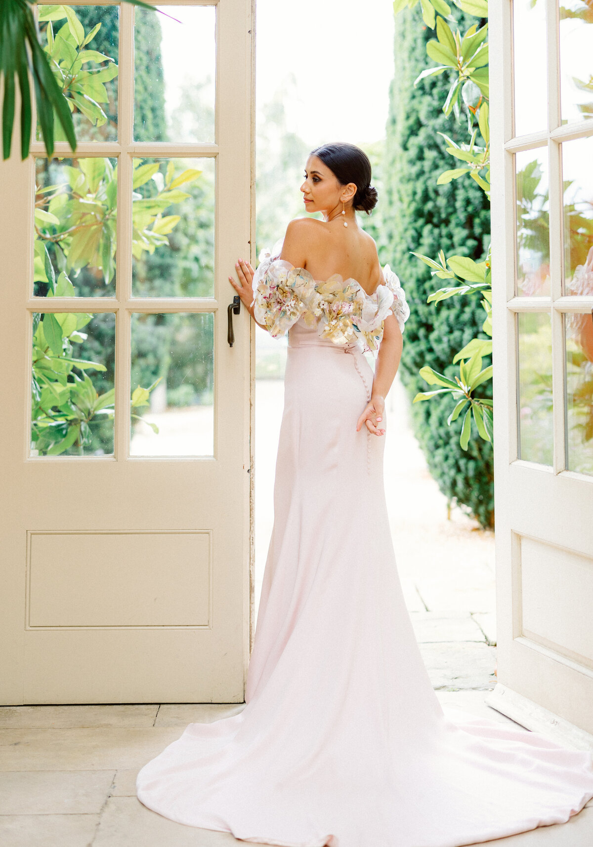 bride wears designer dress