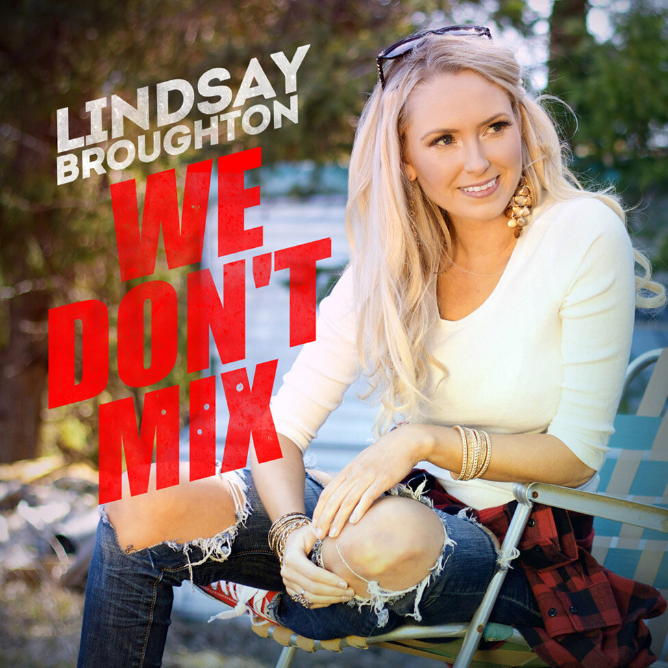 CD Single Cover Title We Don't Mix Artist Lindsay Broughton sitting in lawn chair looking off to side trees behind her