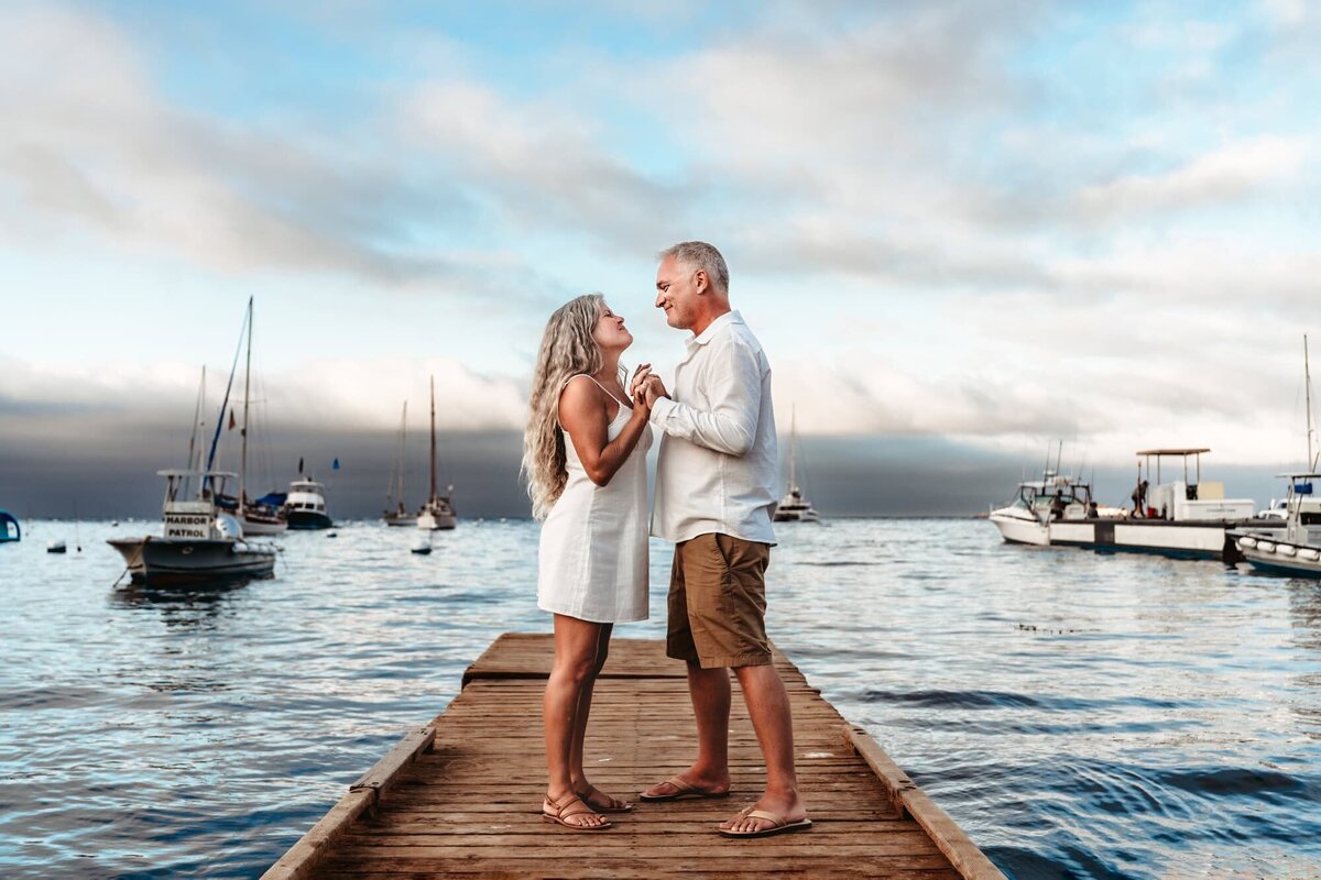 San Diego Family Photographer captures couple standing on dock together