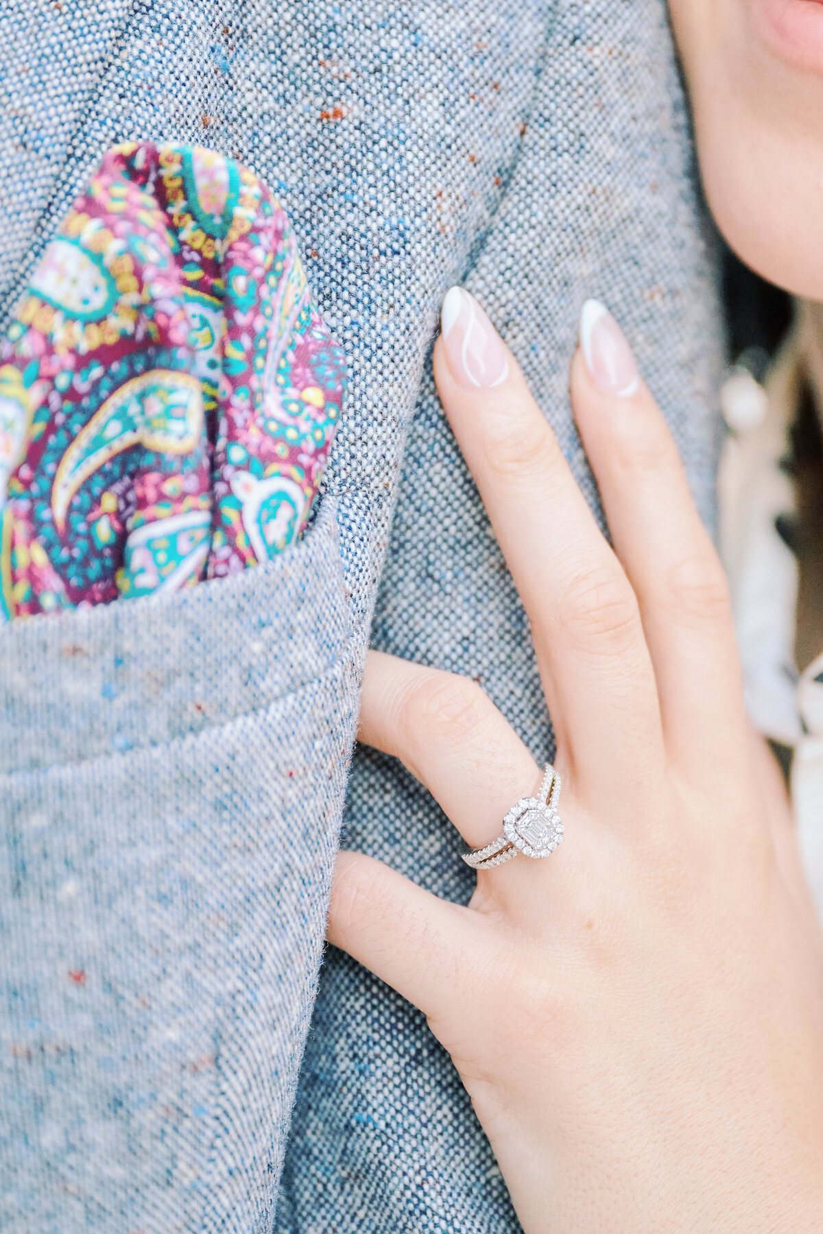Close up photo of hand with an engagement ring after a proposal in New York City.  Taken by NYC Proposal Photographer, Corey Lamar Photography