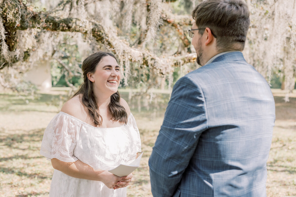 Smiling bride sharing her vows during an intimate ceremony at a Florida State Park.