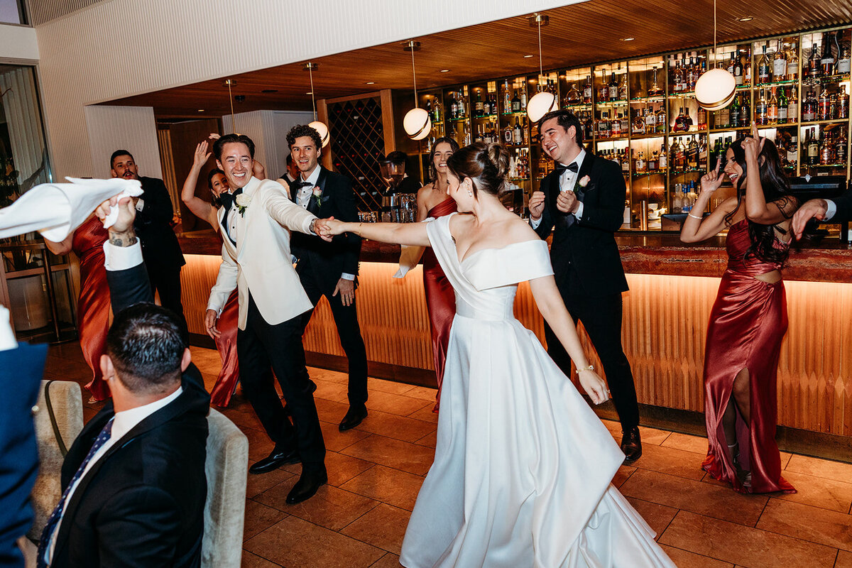 Wedding entrance with bride, groom and their bridal party at The Marion in Canberra ACT