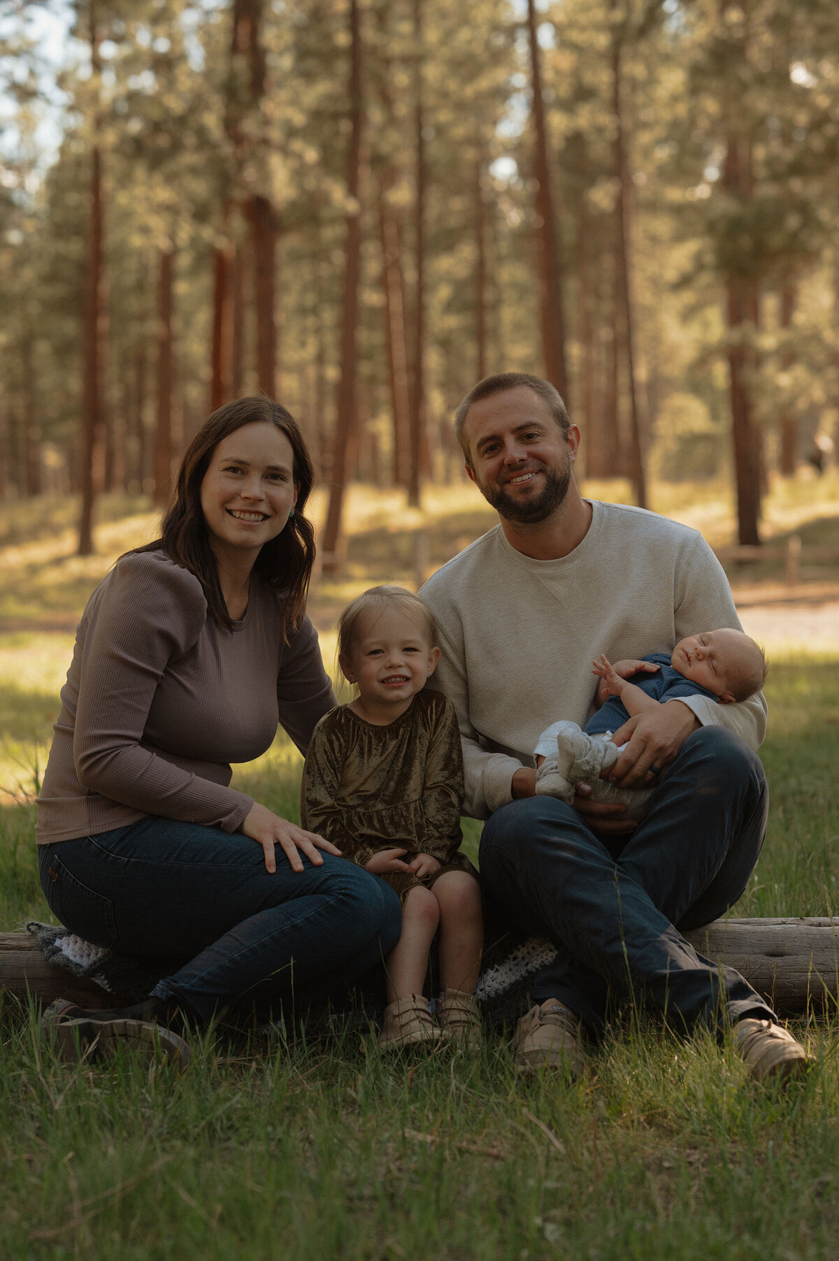 family portrait of four in a park in Bend, Oregon