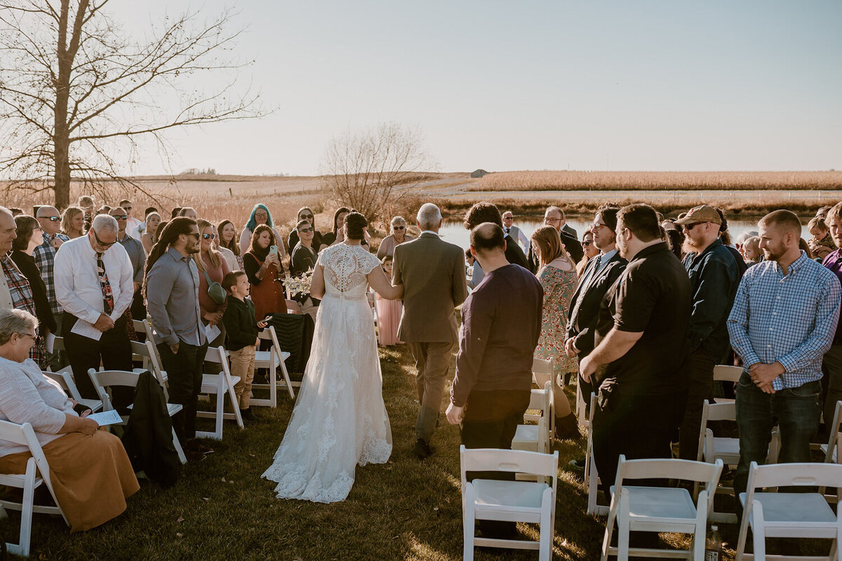 storyteller-collective-photo-co-outdoor-ceremony-walk-down-the-aisle-iowa