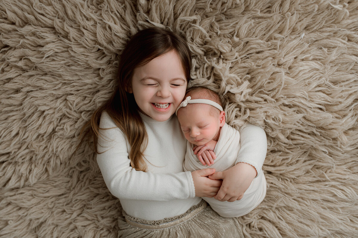 Sister and baby newborn session