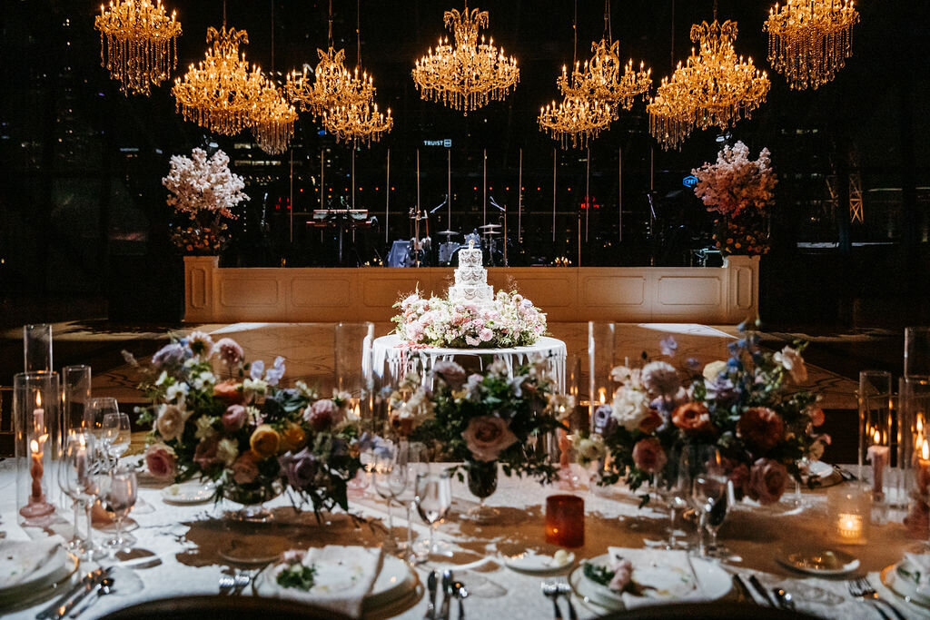 colorful wedding reception with chandeliers