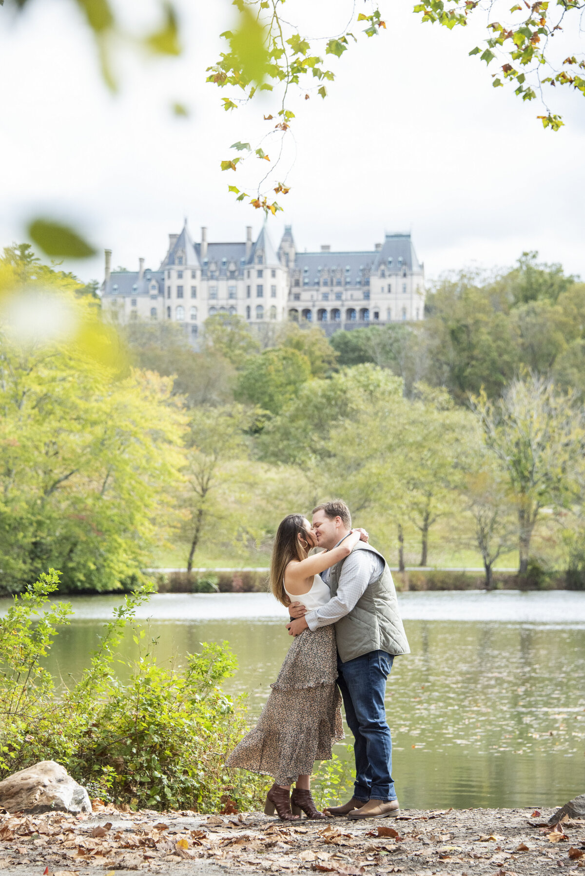 Couple kissing Biltmore Estate engagement proposal