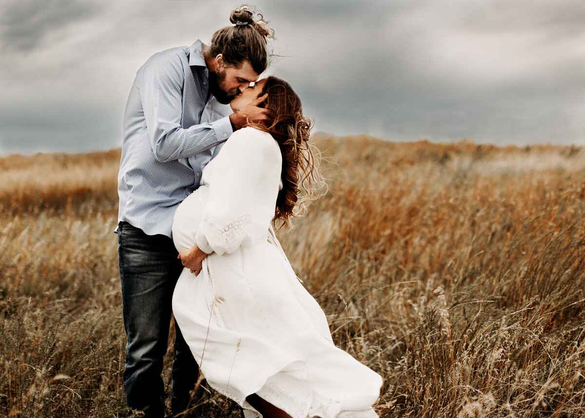 Windy couples maternity photography session in Louisville Colorado