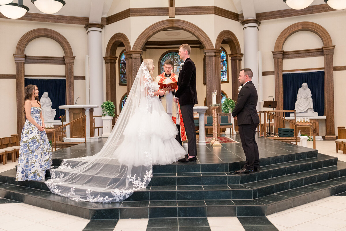wedding-photography-Our-Lady-of-Mercy-Catholic-Church-congressional-country-club-101