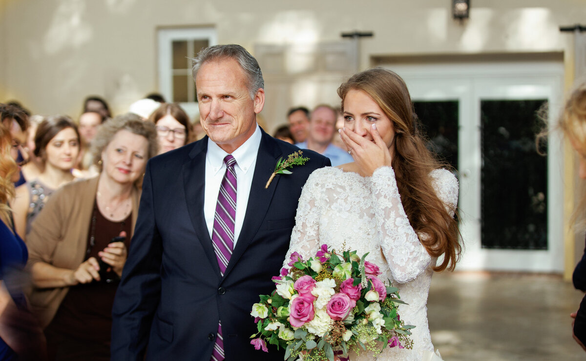 65-bride-walking-down-aisle-the-addison-photographer