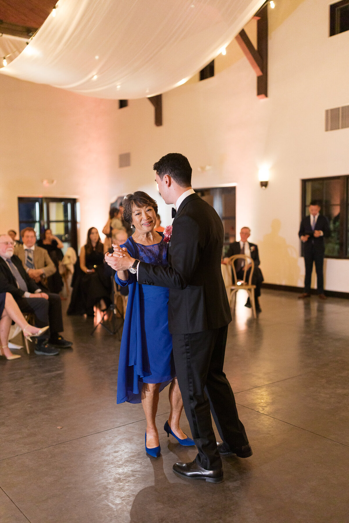 Groom and mother of groom dance