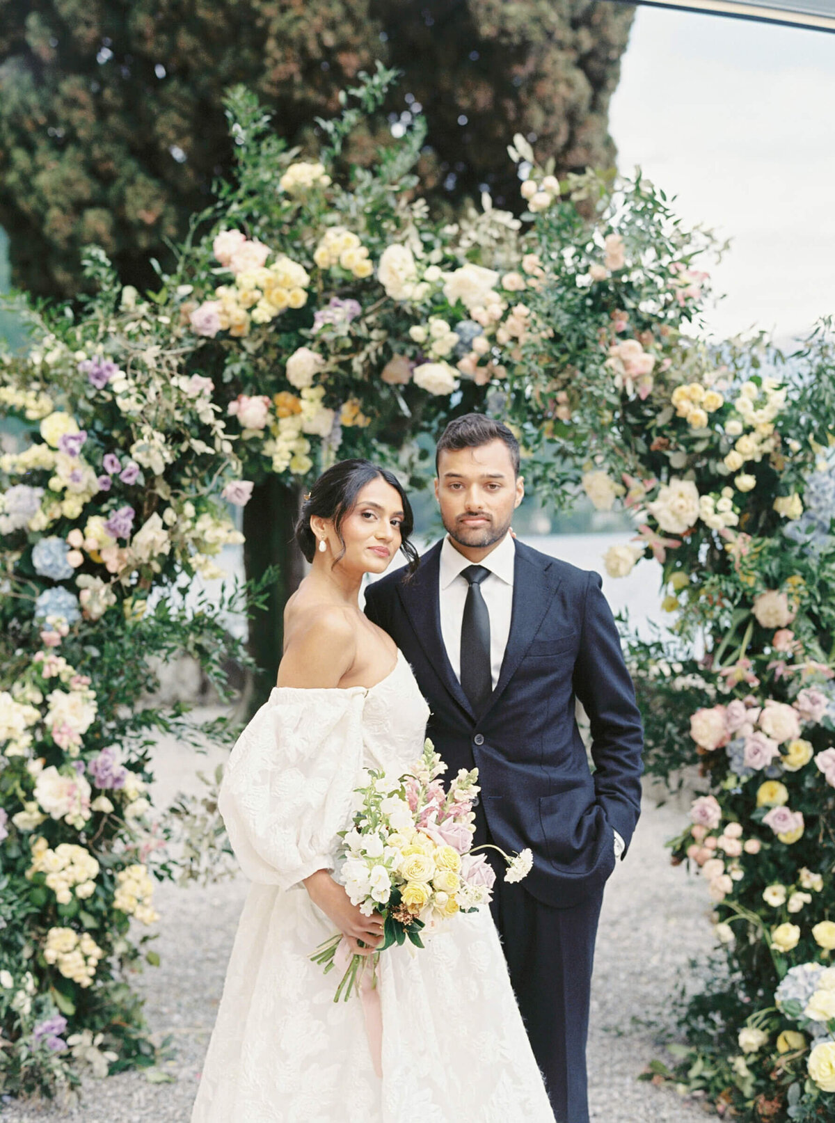 A wedding day photo of the bride and groom at Villa Aura del Lago on Lake Como in Italy