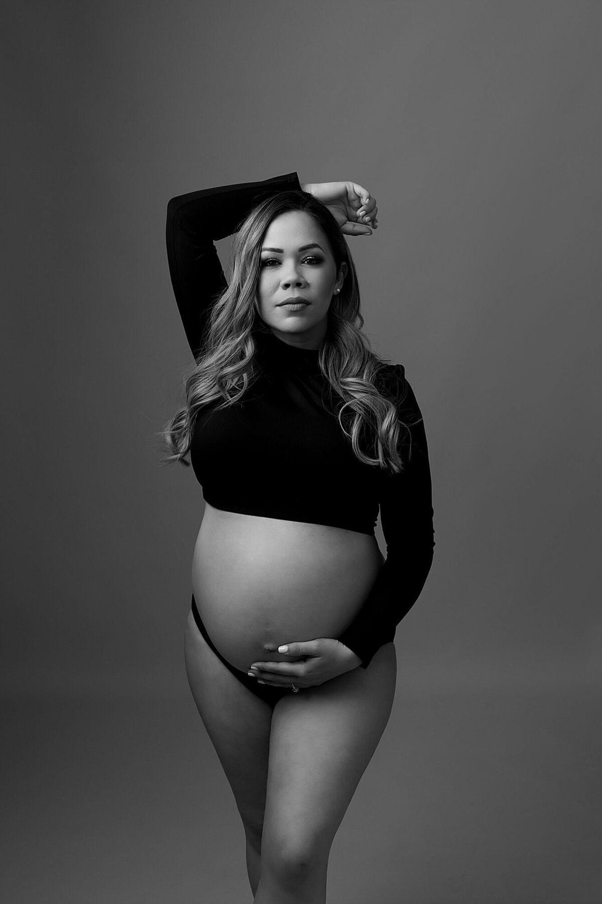 black and white studio maternity photo
