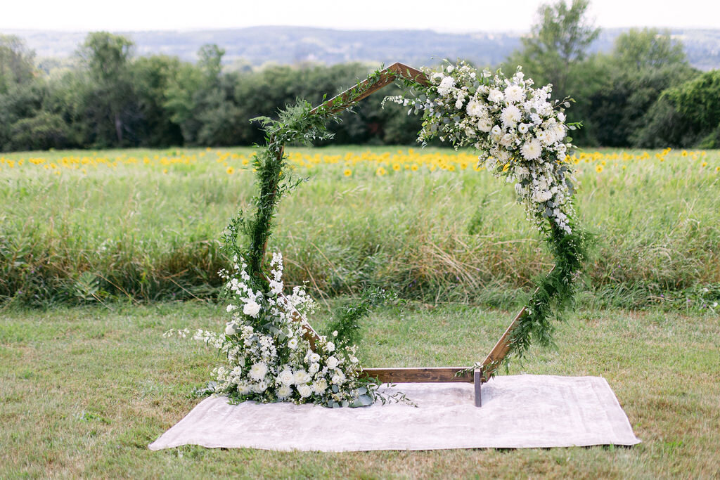 wood-ceremony-arch-white-florals