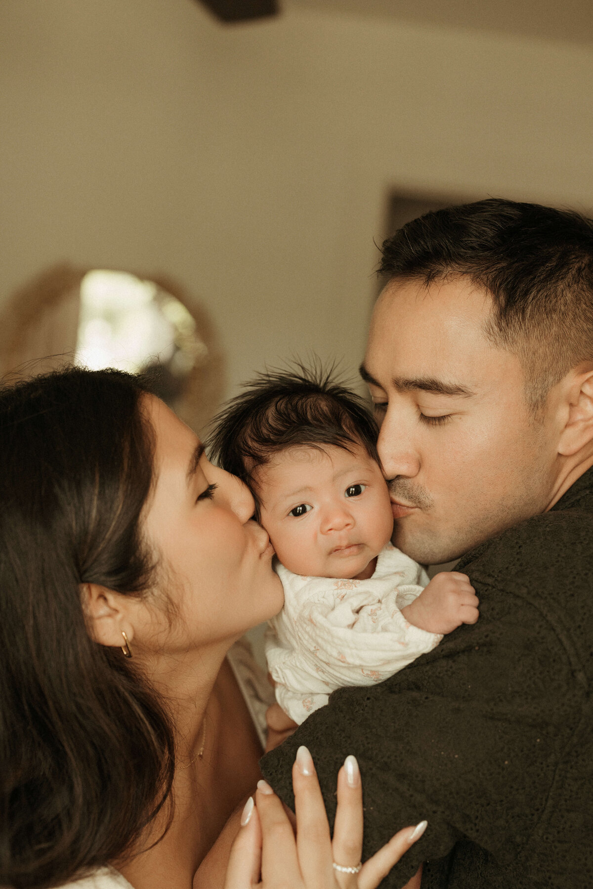 Baby sleeping in parents’ bedroom during Franklin TN lifestyle newborn shoot