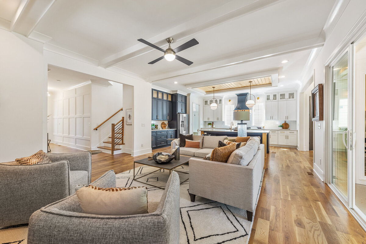 living room with grey couch and fireplace