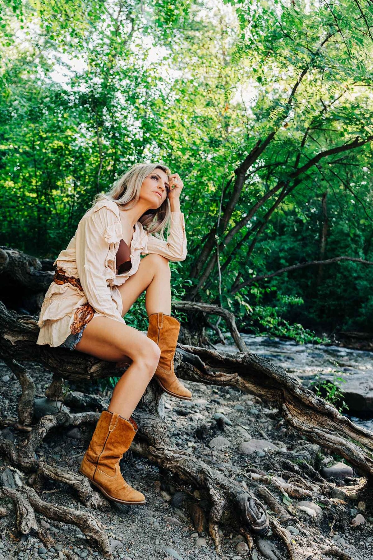 Outdoor portrait female Montana model in boots at Greenough Park, Missoula