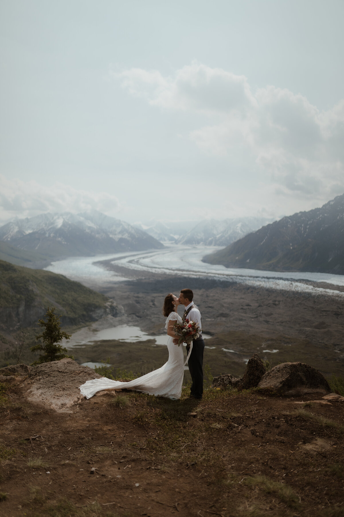 Wedding couple by glacier
