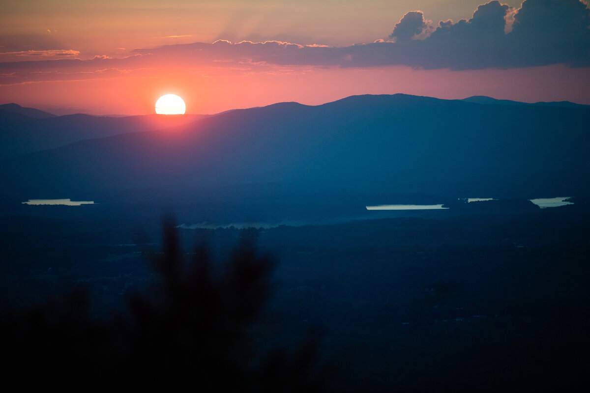 The view of the Blue Ridge Mountains during sunset from Hidden Hill Wedding and Event Venue in Morganton, NC.